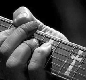 A close up on Iommi's thimbles.