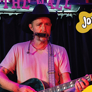 Jonathan Terrell plays guitar and sings