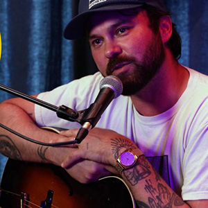 Shakey Graves with a guitar